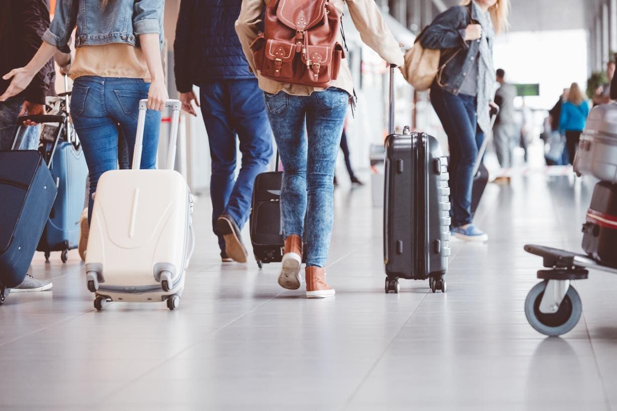 People with Suitcases